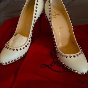 A collectors item. Pretty white studded heel. Price listed or better offer.